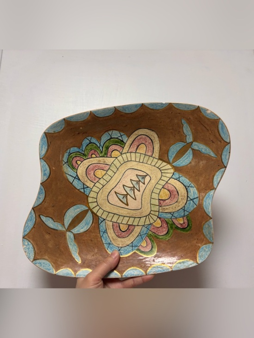 Hand-Painted Decorative Ceramic Plate in Brown and Blue